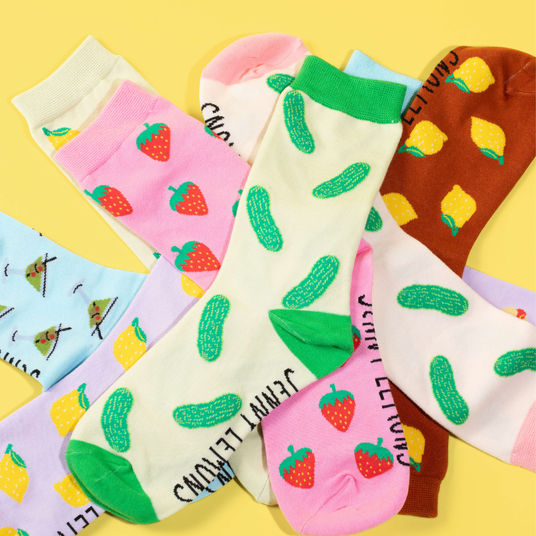strawberries socks on a pink background