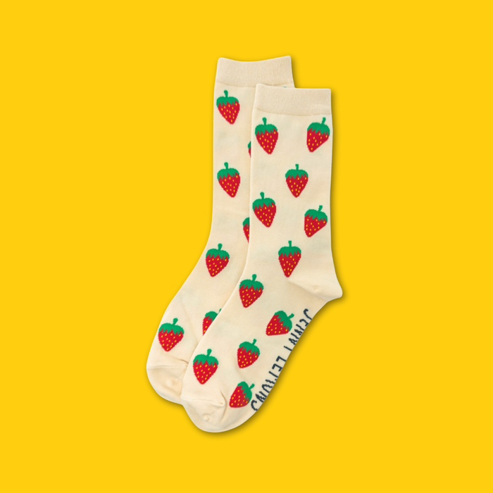 strawberries socks on a pink background